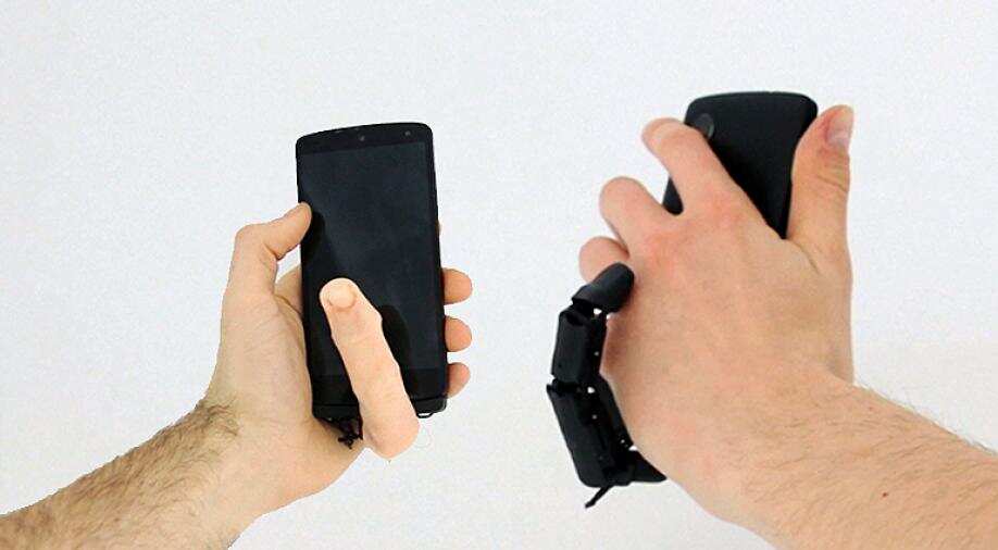Why is a finger sticking out of your mobile phone so creepy? World News